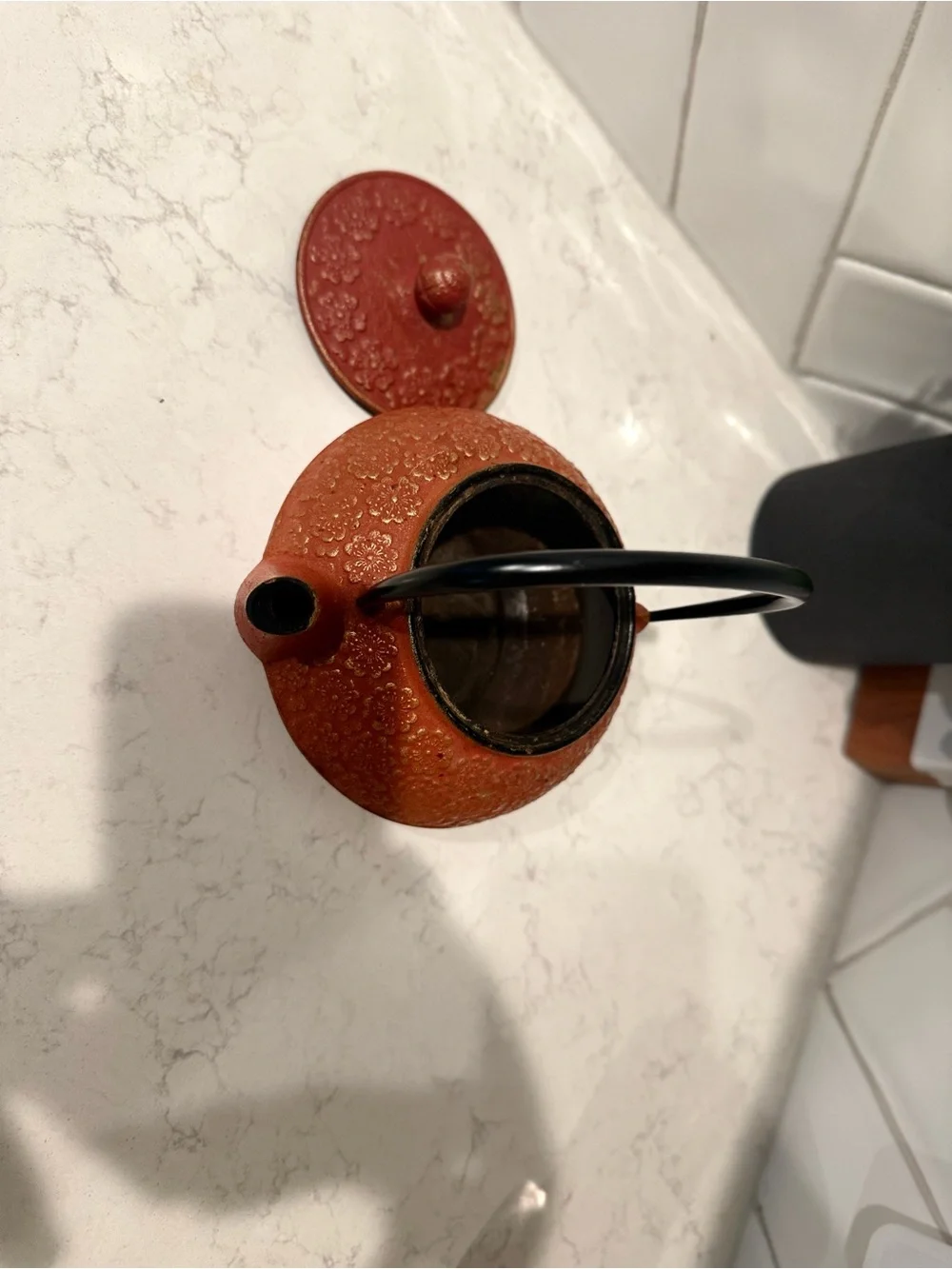Cast Iron Red Floral Textured Teapot with Black Handle
